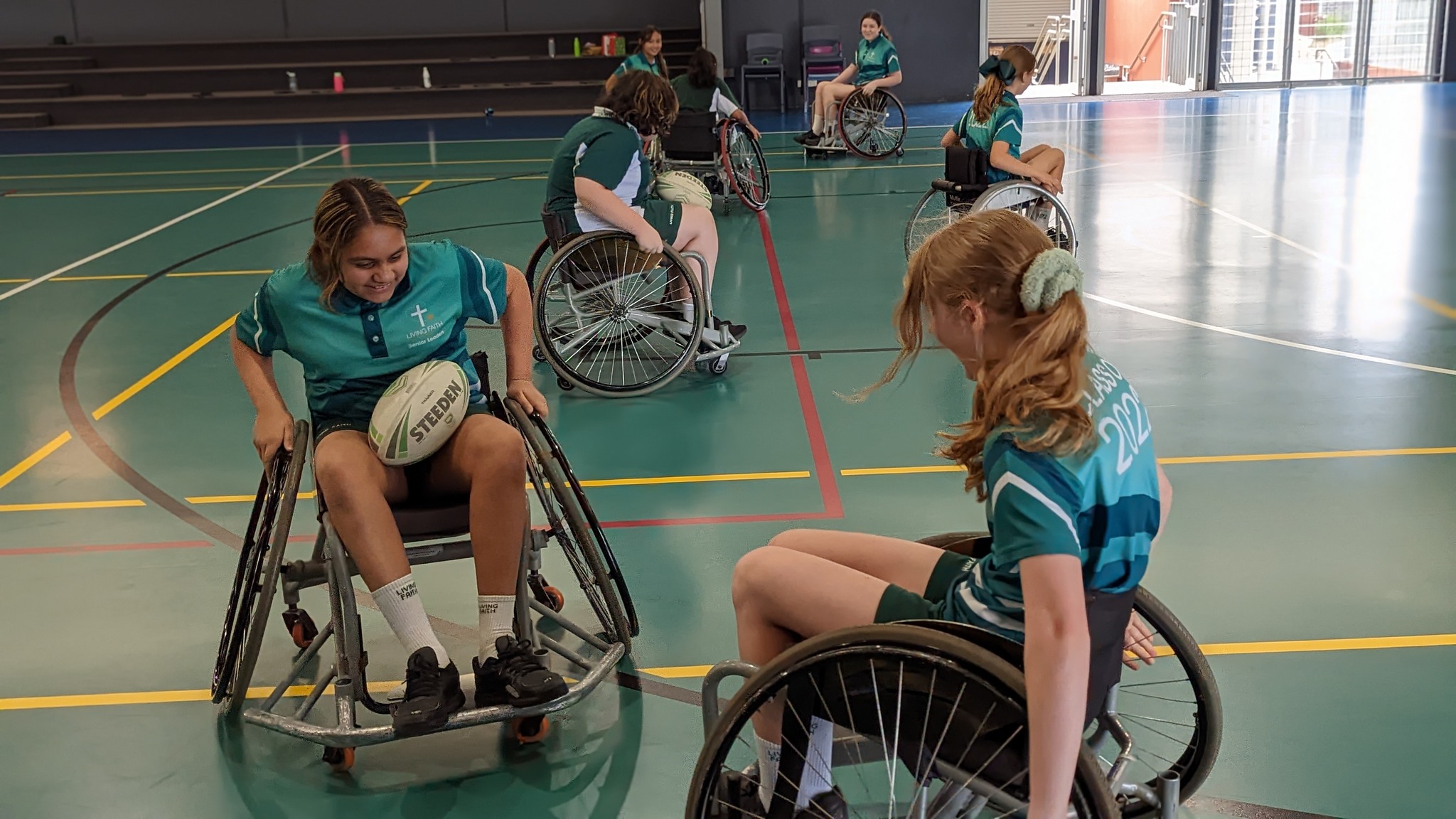 Children in wheelchairs playing rugby league