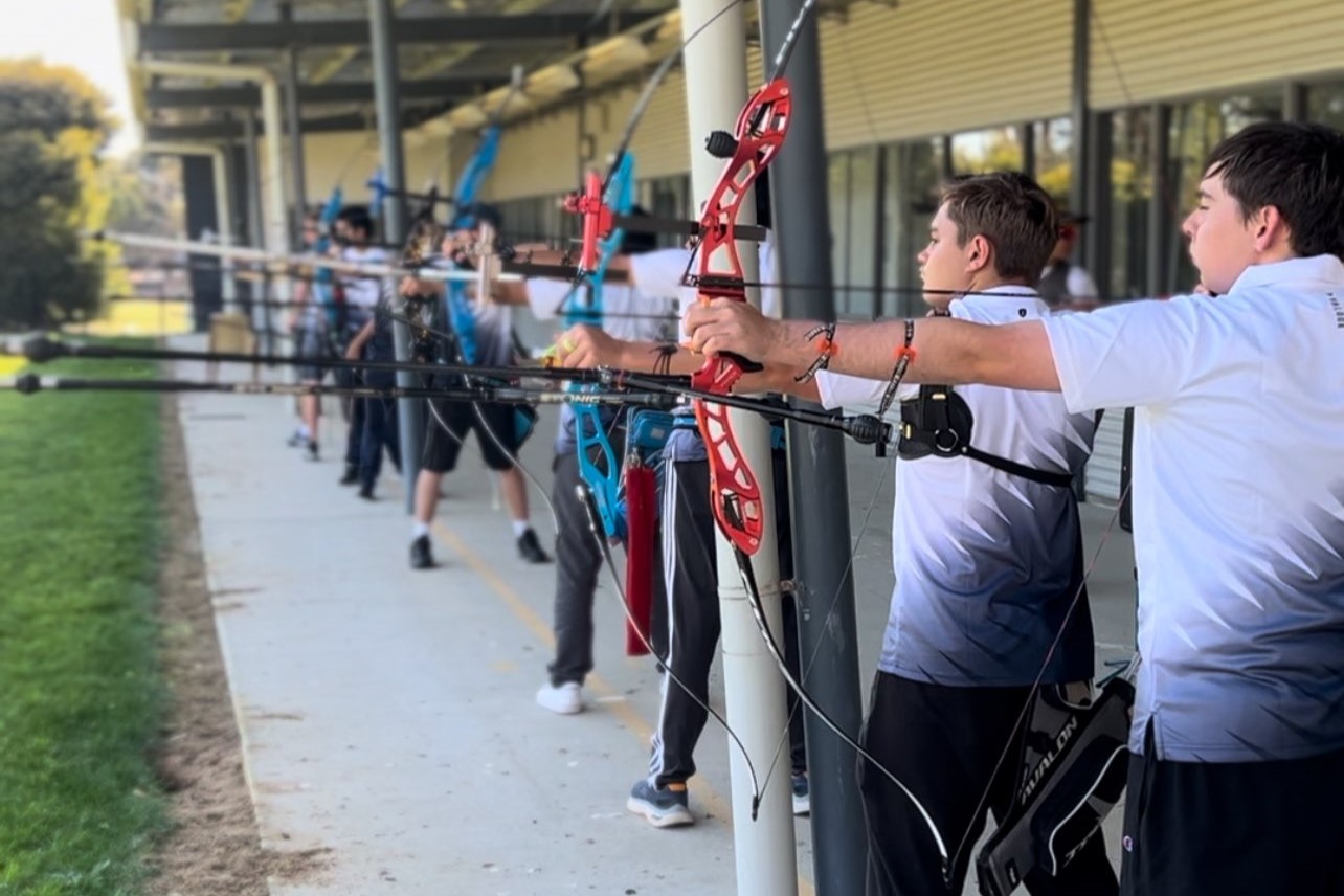 Archers shooting at AIS campus.