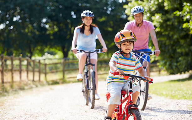 family riding bikes