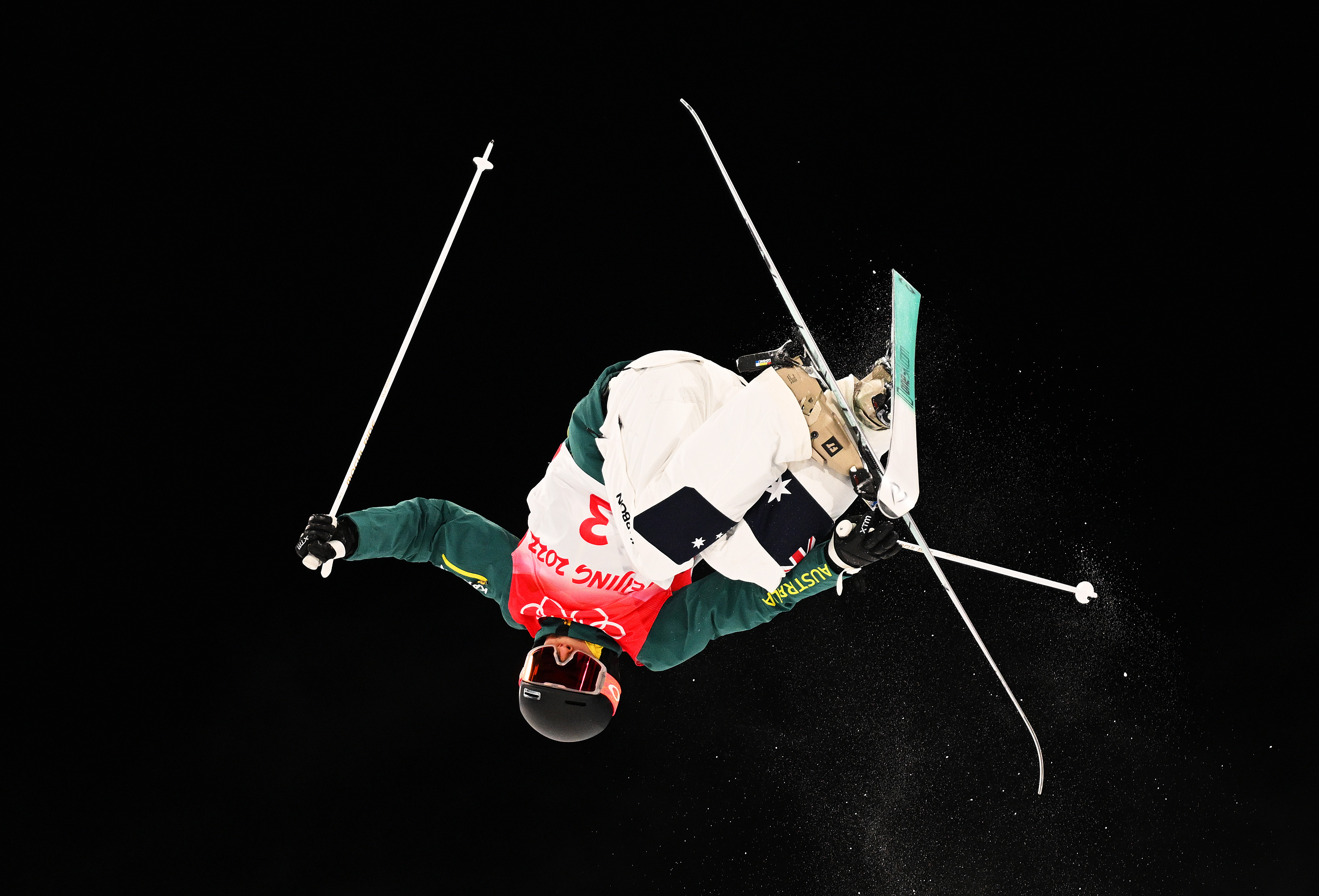 Jakara Anthony jumps during the women’s freestyle moguls competition in Beijing.