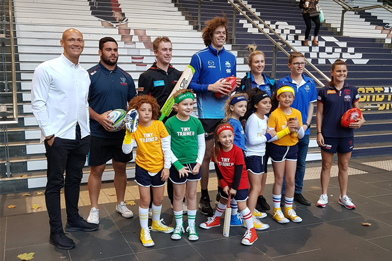 The Tiny Trainers and a group of elite athletes gathered at Melbourne's Southern Cross Station.