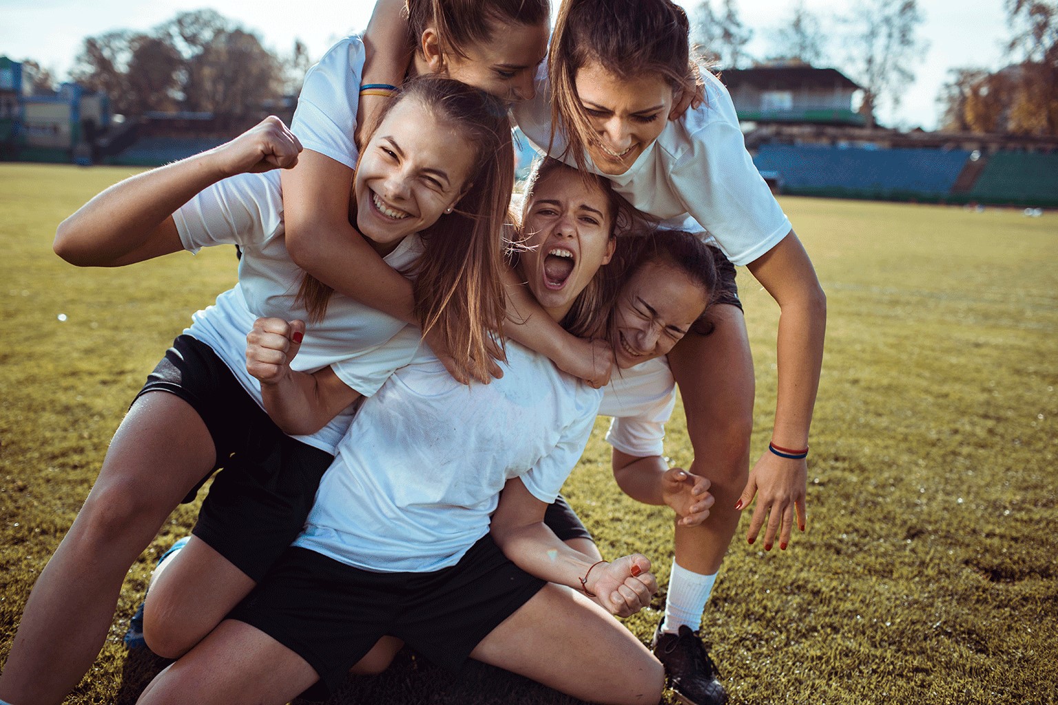 Image of female sporting team celebrating