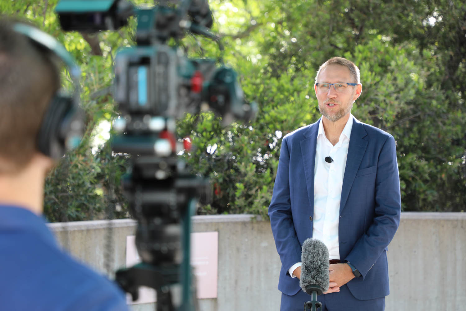 A man being interviewed on video camera