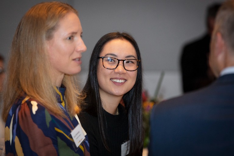 People chatting at the Athlete Accelerate event