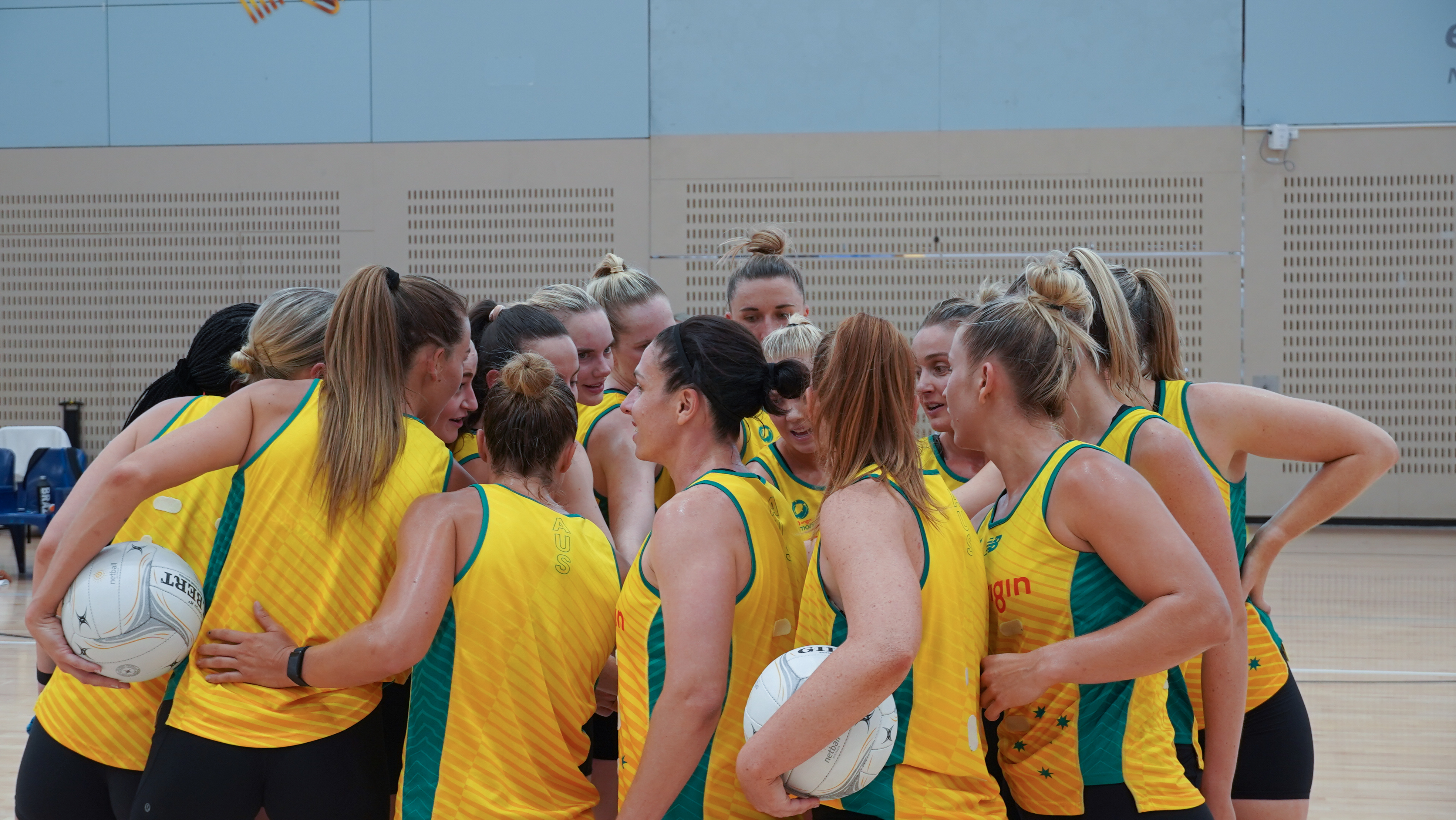 Australian Diamonds team huddle during AIS training session