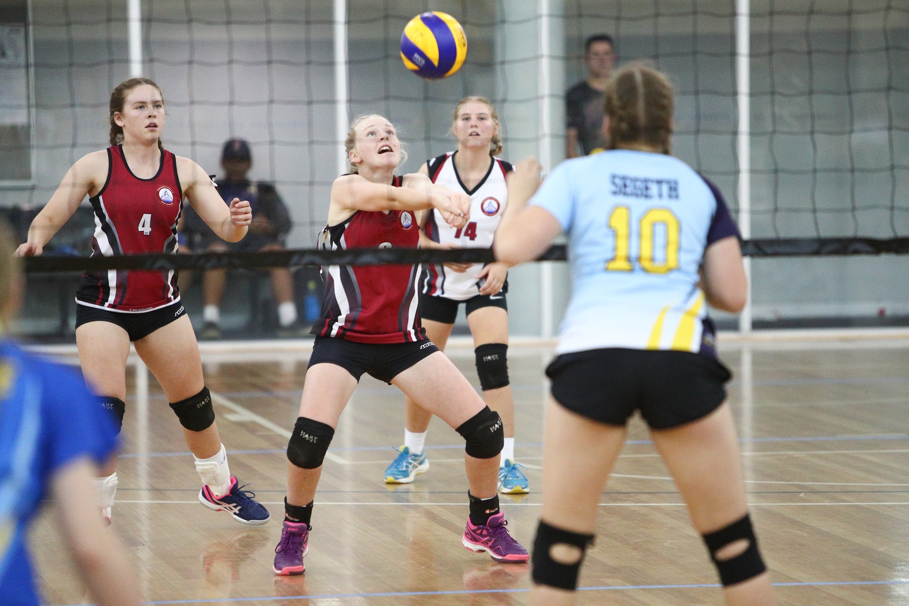 Secondary School Girls Playing Volleyball