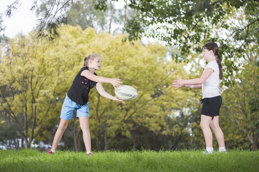 Children play touch football