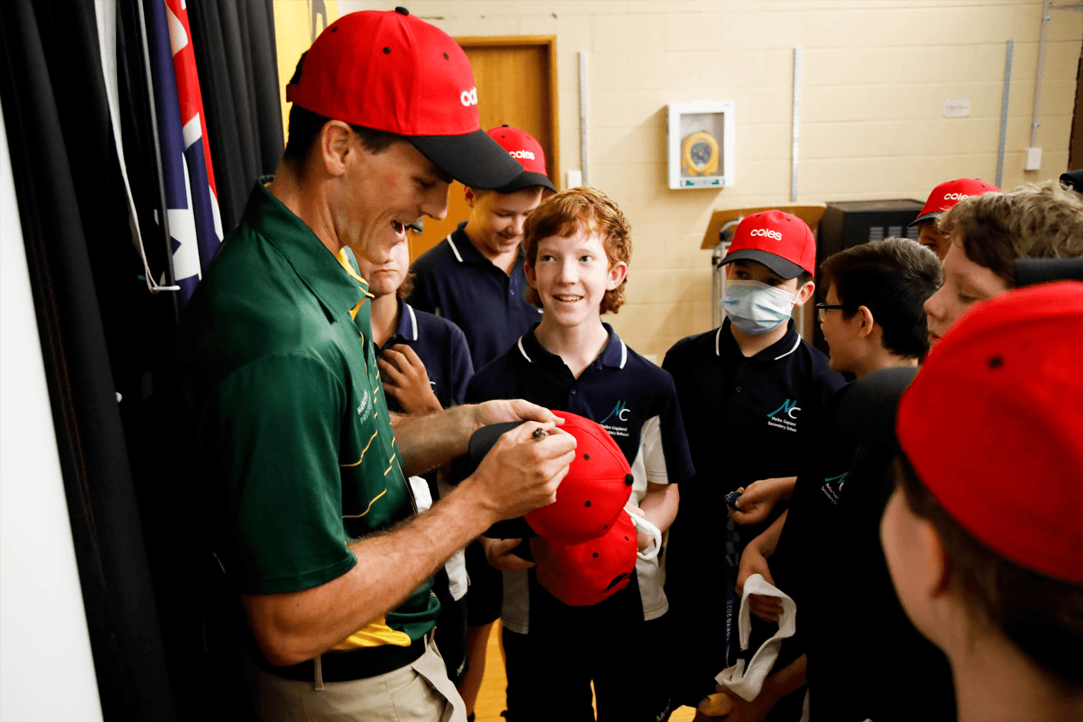 Olympic rower Alex Purnell is signs autographs for students