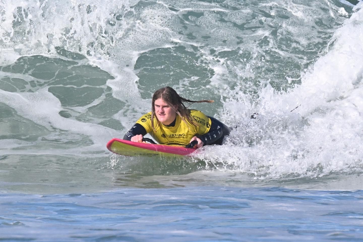 Max Devery on a wave in the ocean