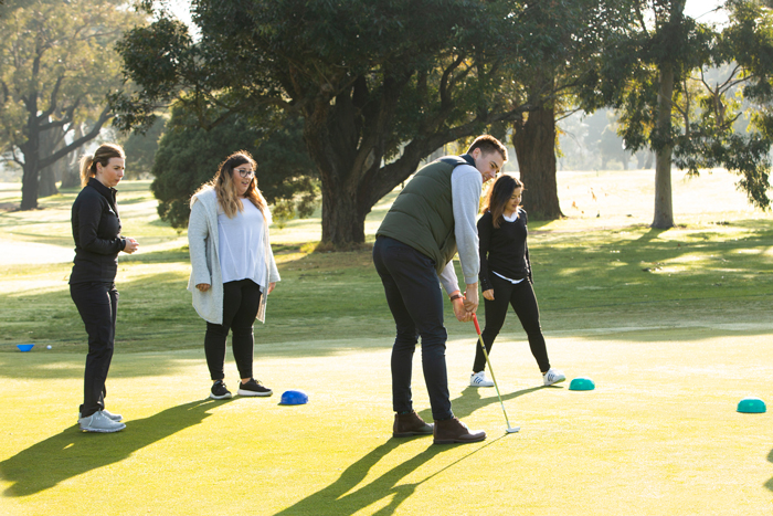 people playing golf