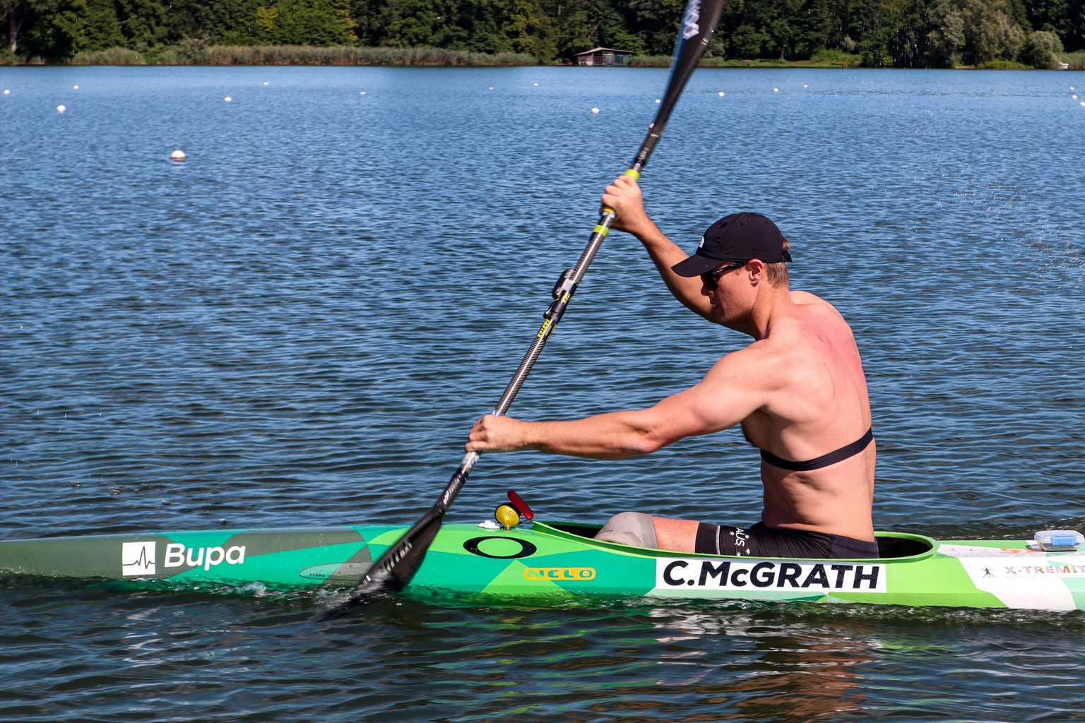 Curtis McGrath paddles on lake in ETC.