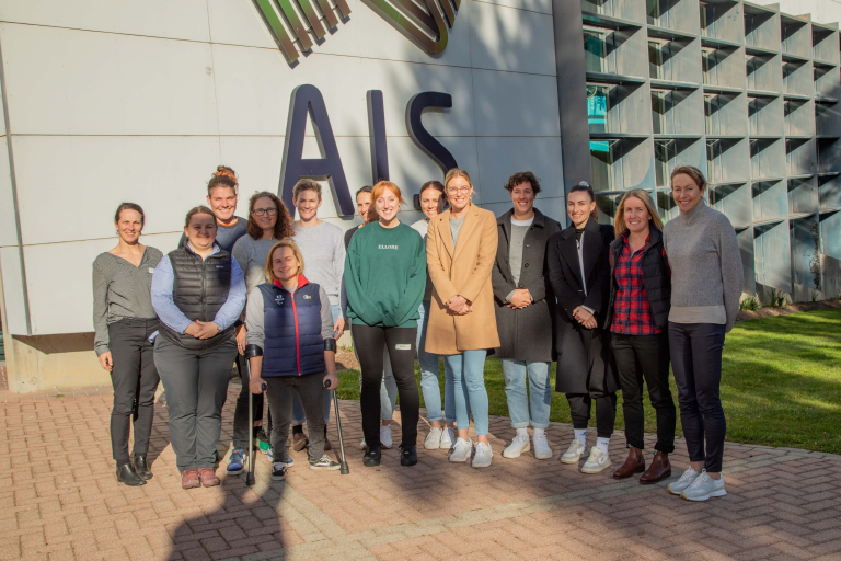 Group photo of women standing together outside the AIS Visitor Centre