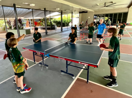 children playing table tennis