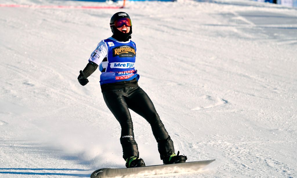 Snowboard cross world champion Belle Brockhoff slides down the snow 