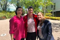 Anna Meares Petria Thomas and Kate McLoughlin standing outside