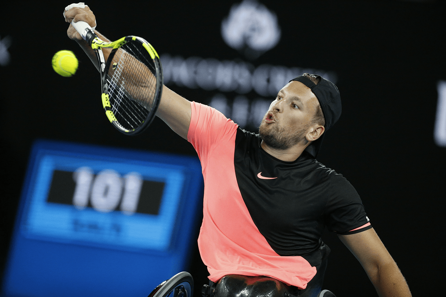 Image of Dylan Alcott playing wheelchair tennis
