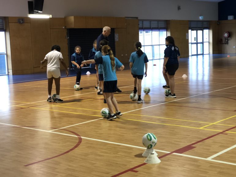 Children playing football