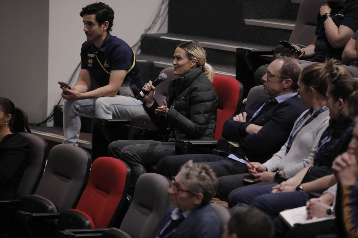 People seated in an auditorium